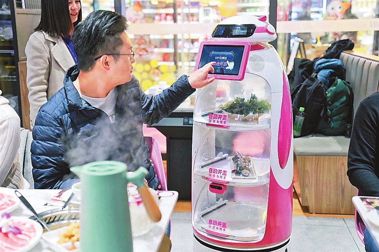 Robots at work at hotpot restaurant