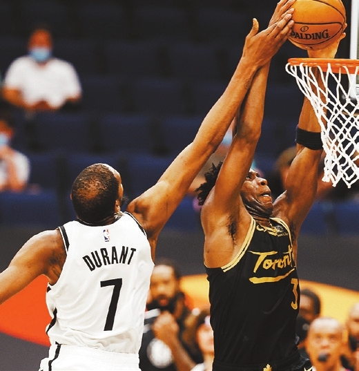 Nets rally past Raptors, clinch playoff spot